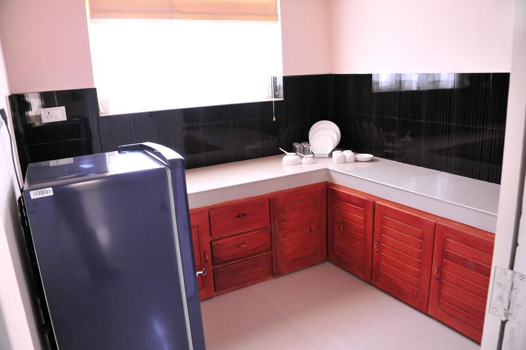 Wayanad Cliff Hotels Apartments กัลปัตตา ห้อง รูปภาพ